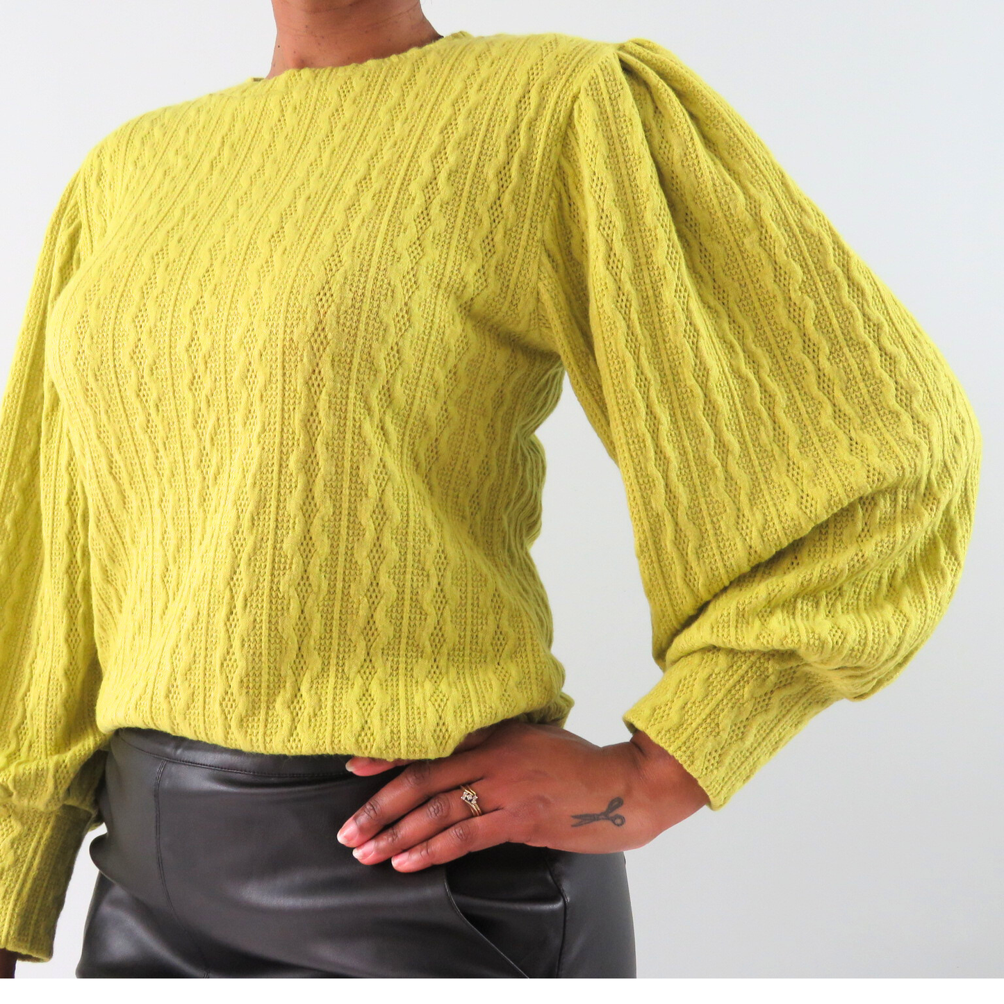 Pleated sleeve sweater